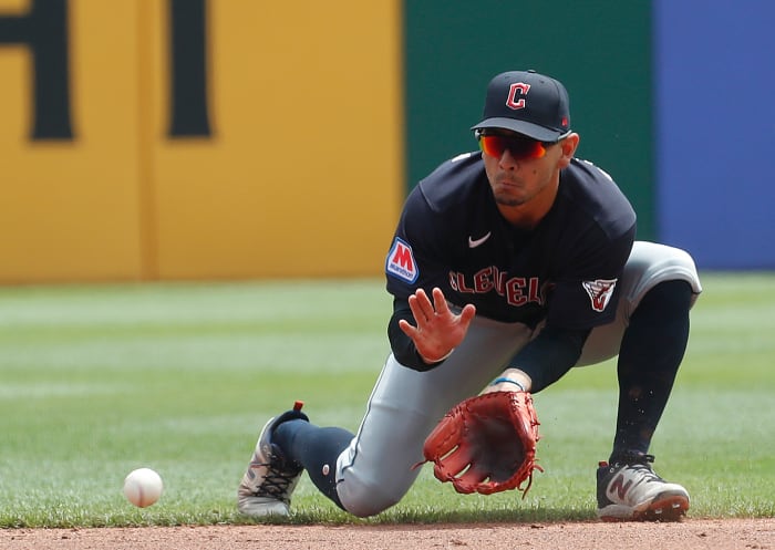 Jul 19, 2023; Pittsburgh, Pennsylvania, USA; Cleveland Guardians second baseman Andres Gimenez (0) fields a ground ball for an out against Pittsburgh Pirates center fielder Jack Suwinski (not pictured)) during the third inning at PNC Park. Mandatory Credit: Charles LeClaire-USA TODAY Sports